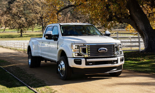 2020 Ford F Series White parked on Country Road