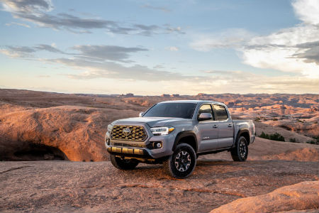 2020 Toyota Tacoma Parked Near a Cliff Edge in a Desert